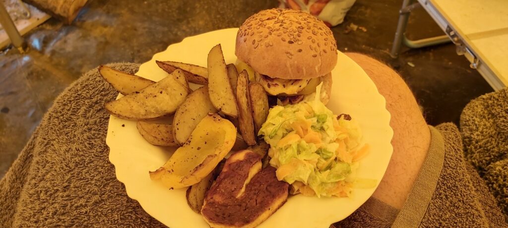 Halloumi Burger, roasted pepper with sweet chilli sauce, wedges and side-salad of shredded iceberg lettuce and grated carrot in mayo.